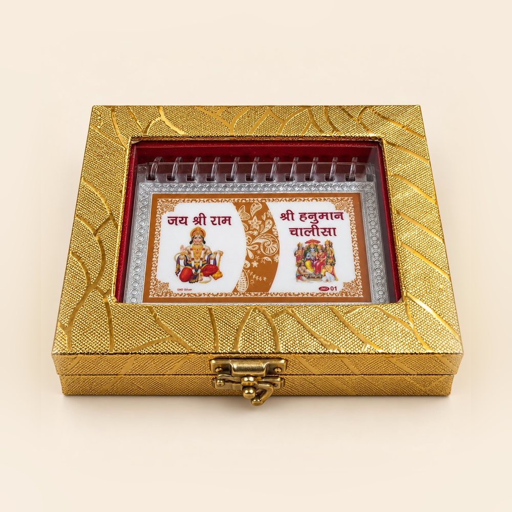 Silver Hanuman Chalisa in a closed golden gift box with a window lid