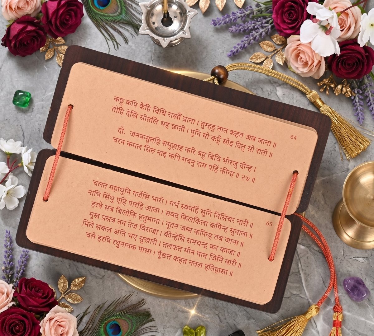 Sundarkand pandulipi open pages with red ink Devanagari doha and chaupai